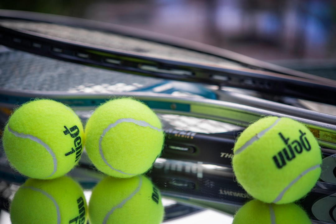 Tennis balls and racquets.